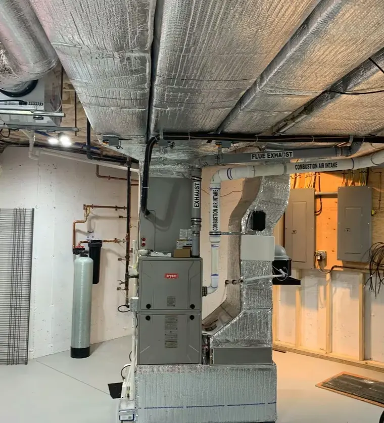 Finished basement mechanical room with furnace and ductwork